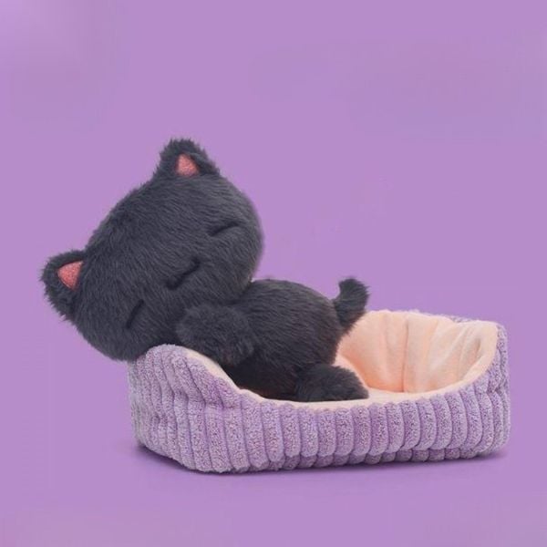 Takara sleeping black cat plush in textured basket bed